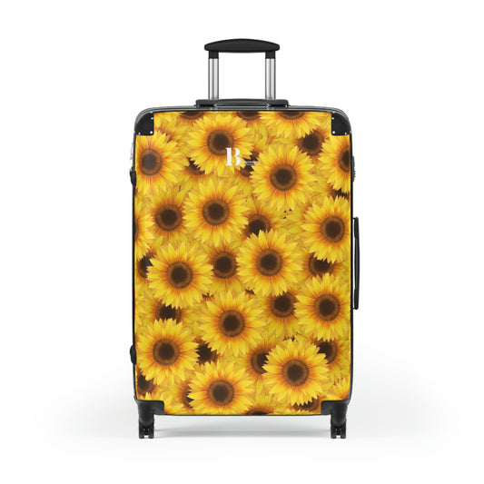 Customized hard-shell suitcases with all-over sunflower prints and dark background
